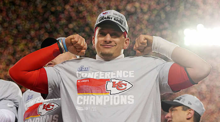 Patrick Mahomes flexes in an AFC championship t-shirt